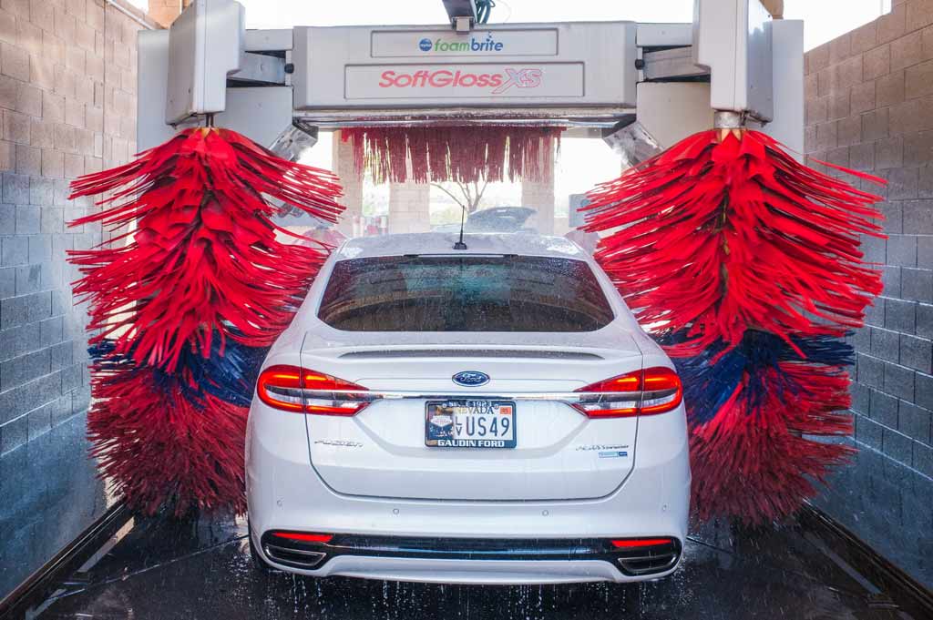 Car being washed in preparation for shipping